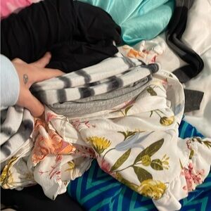 Clothes tee shirts long sleeves some dresses and some basketball shorts